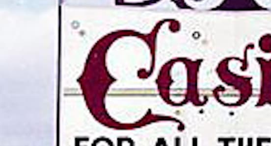 The ornate flourished C from the original Casino sign on Pensacola Beach